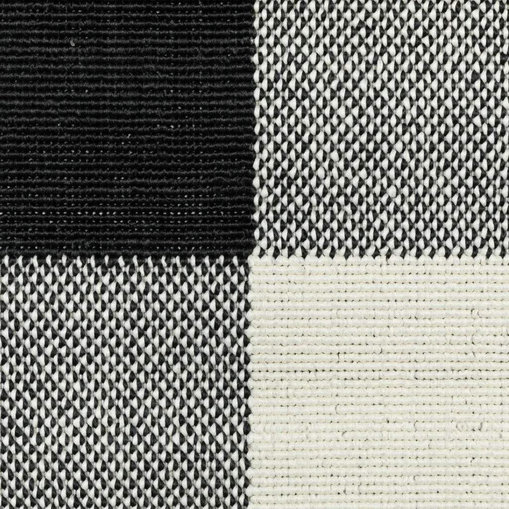 5’x8’ Black and Ivory Gingham Indoor Outdoor Area Rug