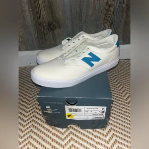 New balance off white with turquoise blue detailing new in box size 8.5 men’s