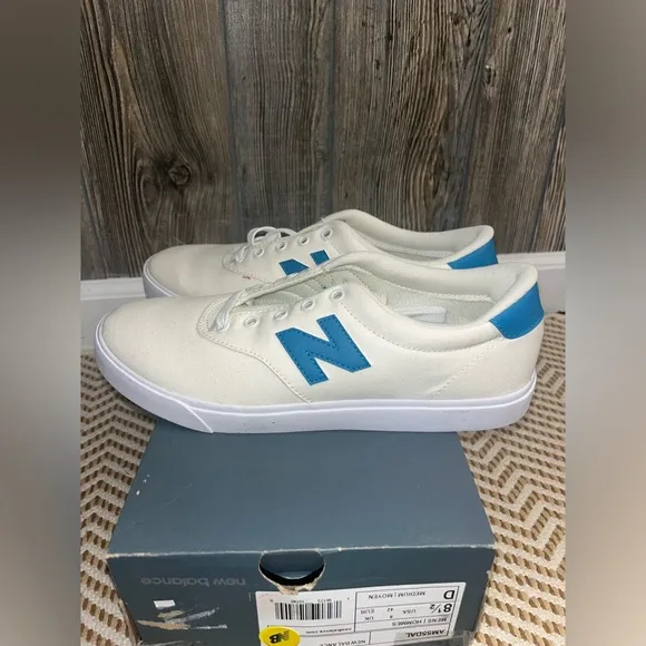 New balance off white with turquoise blue detailing new in box size 8.5 men’s