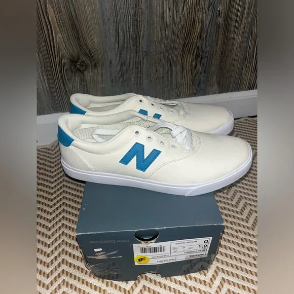 New balance off white with turquoise blue detailing new in box size 8.5 men’s